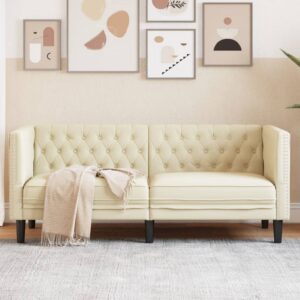 2 személyes krémszínű műbőr chesterfield kanapé